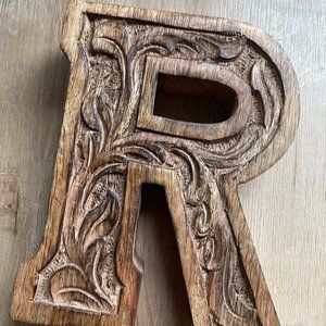 Carved wood letter